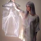 Otago Polytechnic fashion student Jojo Ross  displays one of her five garments,  based on 1960s...