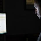 Otago Primary Principals' Association president Whetu Cormick reads an email from Novopay, hours...