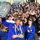 Otago rugby player Tony Ensor shows off the shield at South Otago High School in Balclutha...