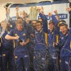 Otago's cricketers celebrate winning the twenty/20 title at University Oval yesterday. Photo by...