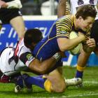 Otago's Glen Dickson goes over to score a try against North Harbour. Photo by Peter McIntosh.