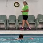 Otago Therapeutic Pool supervisor Gaye Davies yesterday watches swimmers during the pool’s last...