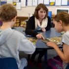 Otago University College of Education student Sacha Hatton (21) takes a reading lesson at George...