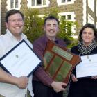Otago University Students' Association 2010 top teacher recipient Tony Zaharic (centre), of the...