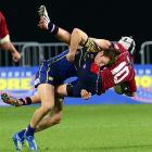 Otago wing Marshall Suckling slams into Tasman first five-eighth Hayden Cripps during their ITM...