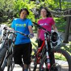 Outside Sports' Naomi Wilson and Queenstown Mountain Biking Club secretary Indri Clendon stand...