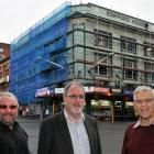 Outside Stafford House on Monday are (from left) Andrew White and Chris Willis, with former...