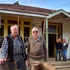 Outside the 1914 Dunedin villa about to be moved to Mosgiel are (from left) former residents...