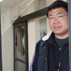 David Liu surveys smashed windows at the former Oamaru hospital.  Photo by Sally Rae.