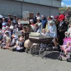 About 50 children, staff and parents from Maheno School line up for the Grand Street Parade.