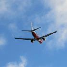 Pacific Blue flight DJ89 to Sydney departs from Queenstown Airport. Photo by Otago Daily Times.