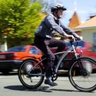 Palmerston man Chris Walker rides one of the electrically-assisted bicycles he hopes will become...