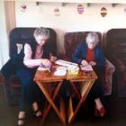 Pam Gale (left) and Gwen Staynes work on their Easter craft at the Mosgiel Elderly Care Trust...