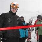 Paralympian gold medallist Adam Hall cuts the ribbon to the Valley View chairlift and Goldrush...