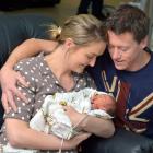 Parents Nicola and Brent Prue dote over new son Angus. PHOTO: GERARD O'BRIEN