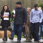 Paua to the People members (from left) Justine Camp, Kees Meeuws and Lloyd McGinty walk towards...