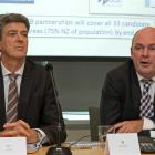 Paul Reynolds, CEO, Telecom, left, and Minister for Communications and Information Technology,...