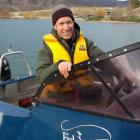 Paul van Klink undergoes boat training on Lake Dunstan yesterday, for his new role in Cromwell....