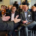 Payless Energy managing director Chessa  Mierzejewski (obscured) addresses guests at the company...