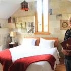 Pen-y-bryn Lodge co-owner James Glucksman inspects a room of the historic luxury lodge  in Oamaru...