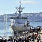 People queue on the Birch St wharf to board the HMNZS Otago at the public open day yesterday....
