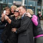 People swarmed for a selfie with Prime Minister John Key when he arrived at ILT Stadium Southland...