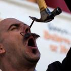 Performance artist Donny Vomit pulls a nail out of his nasal cavity ahead of the sixth annual...