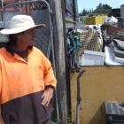 Pete Phillips scans the packed recycling yard.  Photos by Matthew Haggart.