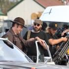 Pete's Dragon director David Lowery instructs an actor during filming of the Walt Disney Picture...