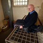 Peter Caswell tests a top bunk for comfort. Photos by ODT.