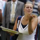 Petra Kvitova of the Czech Republic blows kisses to the crowd after defeating Russia's Maria...