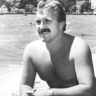 Philip Rush relaxes after another dip in the ocean. Photo from <i>ODT</i> files.