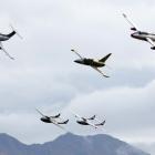 The Gigatown Wanaka jets neck and neck with Mt Roy behind. Photos Stephen Jaquiery