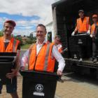 Pictured  delivering the new crates to homes in Meadowstone are (from left) delivery staff member...
