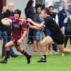 Pirates centre Marshall Suckling (right) catches Alhambra-Union flanker Ryan Bowater during the...