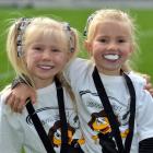 Pirates Rippa rugby players Jemima (6, left) and Lydia Hortop-Blair (4) abuzz after speaking to...