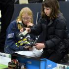 Placing robots on the soccer pitch  Caitlin Shaw (left) and Heather Robertson, both 13, watch...