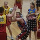 Playing a charity basketball and netball match at the Edgar Centre yesterday are (from left) Sam...