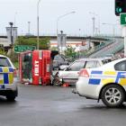Police at the scene of a crash near Queens Gardens yesterday. The crash occurred after a 17-year...