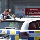 Police at the scene of a robbery at The Warehouse in South Dunedin yesterday. Photo by ODT.
