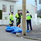 Police inspect the Argyle St and Elgin Rd intersection after a motorcycle crash yesterday. Photo...