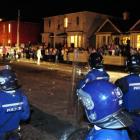 Police move to disperse a Castle St crowd. Photo by Craig Baxter.