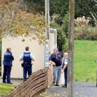 Police search the Toko Golf Club on Back Rd for escaped prisoner Stephen Maddren. Photo from ODT...