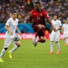Portugal's Nani (C) jumps as he controls the ball near Alejandro Bedoya of the US. REUTERS/Jorge...