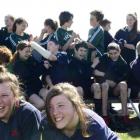 Posing for a photo before pandemonium broke out  are Tahuna Normal Intermediate School twins with...