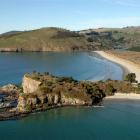 Potato Point is the headland in the centre of the photograph. Photo ODT files.