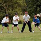 Practising slip catches with sports co-ordinator Michael MacKenzie (right) are John McGlashan...