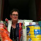 Presbyterian Support development director Lisa Wells (above)  says demand for food bank parcels...