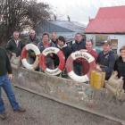 Presenting the maritime artefacts they placed in safekeeping on Saturday are Wakatipu Community...
