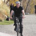 Prime Minister and Minister of Tourism John Key tries the Queenstown Trail at Queenstown...